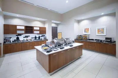a large kitchen with aasteryasteryasteryasteryasteryasteryasteryasteryasteryasteryastery at Hampton Inn & Suites Denver Downtown Convention Center in Denver