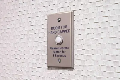 a sign on the side of a brick wall at Homewood Suites- Denver Downtown Convention Center in Denver