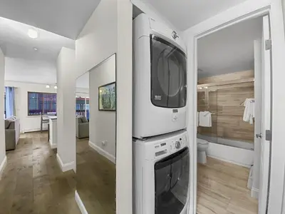 a bathroom with a tv on top of a stove at Swans Nest Villa 1601 Condo in Breckenridge