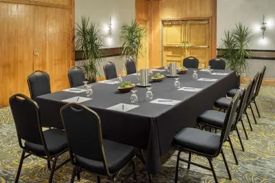 a conference room with a long table and chairs at DoubleTree by Hilton Hotel Denver in Denver