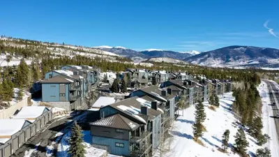 an aerial view of a resort in the snow at Lake Forest Shoreview Condo: Fantastic Views in Frisco