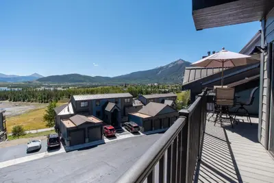 a balcony with a view of a bunch of houses at Lake Forest Summit Condo: Great Penthouse Views in Frisco