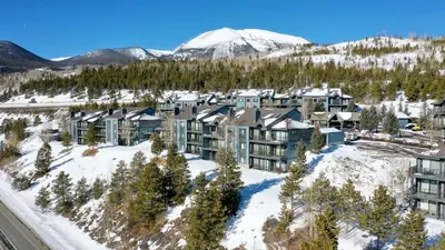 an aerial view of a resort in the snow at Lake Forest Summit Condo: Great Penthouse Views in Frisco