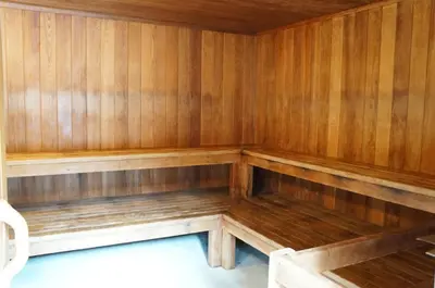 an empty sauna with wooden walls and wooden floors at Mountainside Peakview Condo: Cool Location, Updates in Frisco