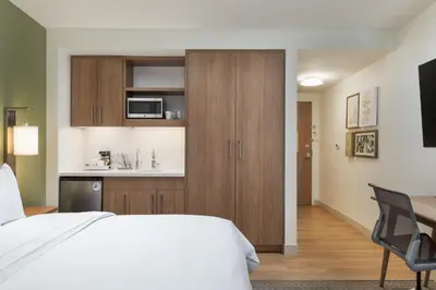 a hotel room with a bed and a desk at Element Denver Downtown East in Denver