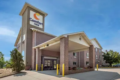 a building with a sign on top of it at Comfort Inn Denver West Arvada Station in Wheat Ridge