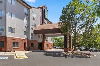 an image of a hotel with a building at Quality Inn & Suites Denver International Airport in Denver