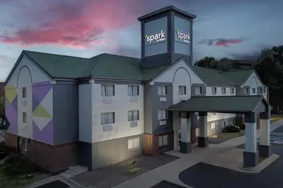 a hotel building with a sign on top of it at Spark by Hilton Lakewood Denver Southwest in Lakewood