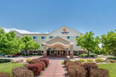 a rendering of the front of a hotel at Comfort Suites Fort Collins Near University in Fort Collins