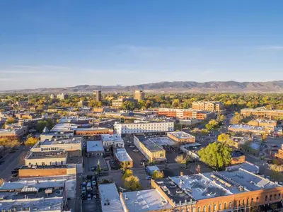 an aerial view of a city with buildings at Baymont by Wyndham Fort Collins in Fort Collins