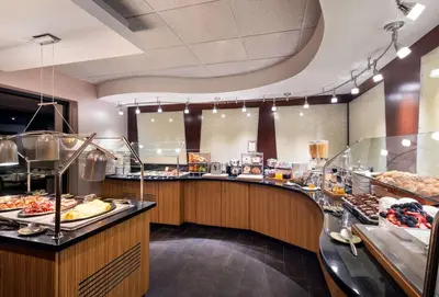 a buffet line with many different types of food at DoubleTree by Hilton Denver Tech in Greenwood Village