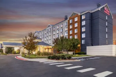 a rendering of a hotel with a parking lot at Hilton Garden Inn Denver Airport in Aurora