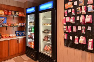 a refrigerator with its door open in a store at Hampton Inn Denver West Federal Center in Lakewood