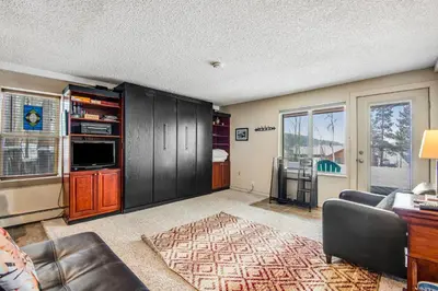 a living room with a couch and a tv at Silver Queen 7300 in Silverthorne