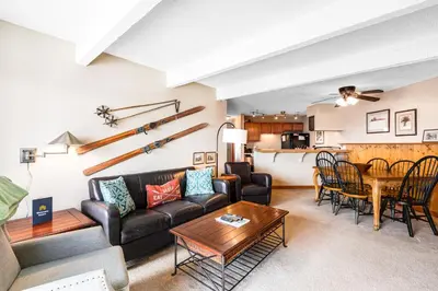 a living room with a couch and a table at 2 Bed 1 Bath Apartment in Wildernest, CO in Silverthorne