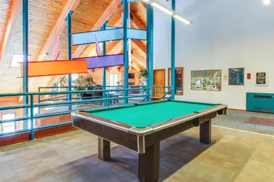 a pool table in a room with a ceiling at Timber Ridge 203 in Silverthorne