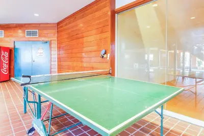 a ping pong table sitting in a room with at Timber Ridge 203 in Silverthorne