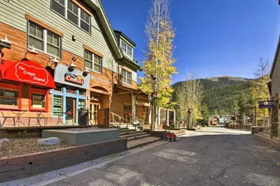 an empty street in front of a building at Cozy And Quaint 1 Bedroom Condo In The Heart Of River Run Village in Keystone