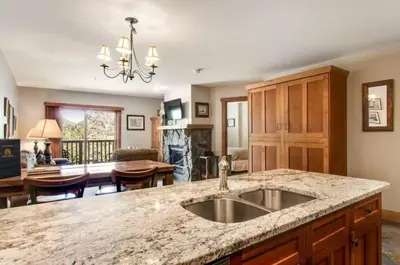a kitchen with a sink and a counter top at 1 Bedroom Colorado Mountain Vacation Rental In River Run Village With Convenient Access To Ski Slopes in Snake River Health Services Incorporated Heliport