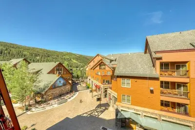 an aerial view of a town with buildings at 1 Bedroom Mountain Condo In River Run Village With Beautiful Mountain Views And Walking Distance To Ski in Keystone