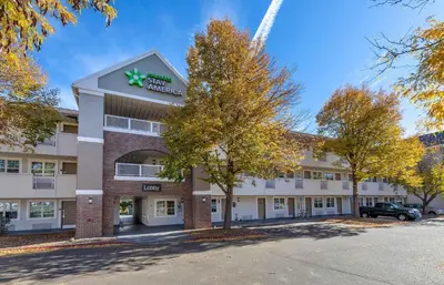 an office building with a star sign on the front at Extended Stay America Select Suites - Denver - Lakewood South in Lakewood
