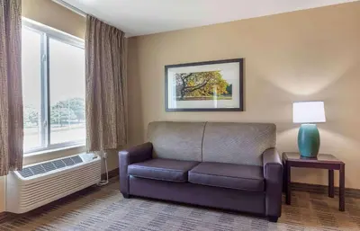 a living room with a couch and a window at Extended Stay America Suites - Denver - Tech Center South - Inverness in Centennial