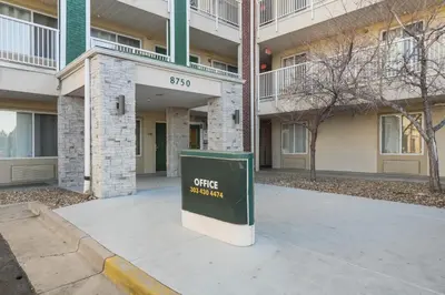a building with a sign that reads coffee station at HomeTowne Studios by Red Roof Denver - Thornton in Thornton