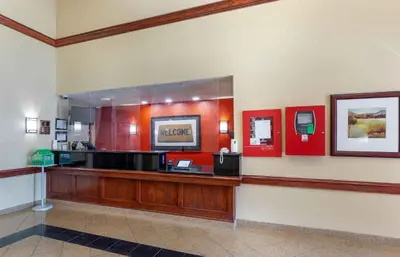 a lobby of a hotel with a reception desk at Extended Stay America Suites - Denver - Aurora North in Aurora