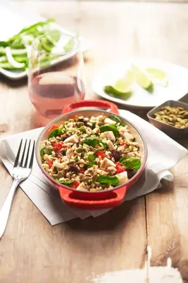 a red bowl of food on a wooden table at Hyatt House Denver Tech Center in Centennial