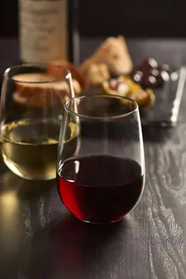 two glasses of wine sitting on a table at Hyatt House Denver Tech Center in Centennial