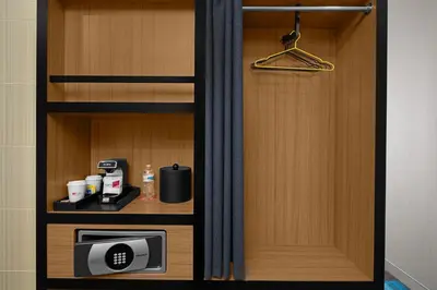 a room with a cupboard with a heater and aiger at Aloft Broomfield Denver in Broomfield