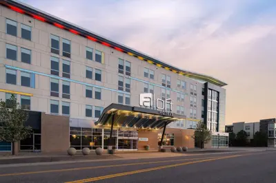 an office building with a sign on it at Aloft Broomfield Denver in Broomfield