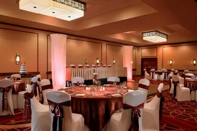 a banquet room with a long table and chairs at Sheraton Hotel Denver Tech Center in Greenwood Village
