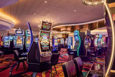 a casino with many slot machines in a room at Horseshoe Black Hawk, A Caesars Destination in Black Hawk