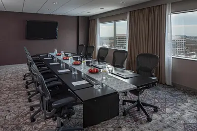 a conference room with a long table and chairs at Hyatt Regency Denver Tech Center in Denver