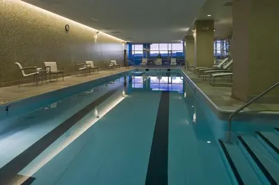 a large swimming pool in a building at Hyatt Regency Denver at Colorado Convention Center in Denver