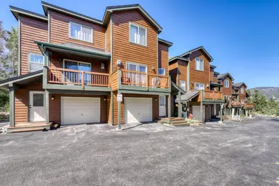 a large house with a driveway in front of it at Aspen Glen 80 in Silverthorne