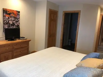 a bedroom with a bed and a tv on a dresser at Buffalo Ridge 2 Bedrooms 1 Loft BRBF in Silverthorne