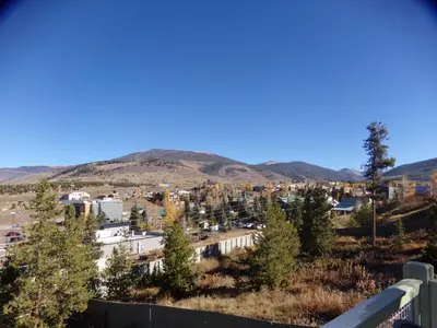 a view of a city with mountains in the background at Anemone Townhome 3 bed 3 bath HTAT in Silverthorne