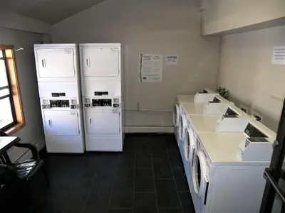 a kitchen with two white refrigerators in a room at Mountainside 2 Bed 2 Bath MSBD in Frisco