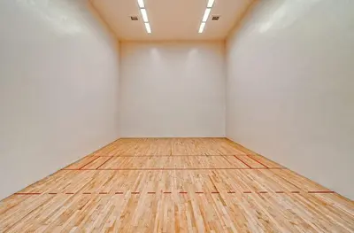 an empty room with a wooden floor and white walls at Mountainside 2 Bed 2 Bath MSBD in Frisco