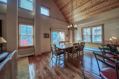 a dining room with a table and chairs at Buffalo Lodge 3 Bed 3 Bath BLCD3 in Keystone