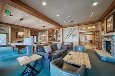 a living room with a couch and a table at Buffalo Lodge 3 Bed 3 Bath BLCD3 in Keystone
