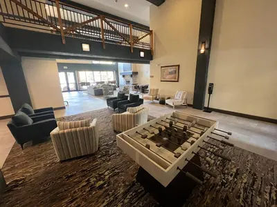 a large living room with a foosball table and chairs at Springs 2 Bed3 Bath plus Murphy SPDW in Keystone