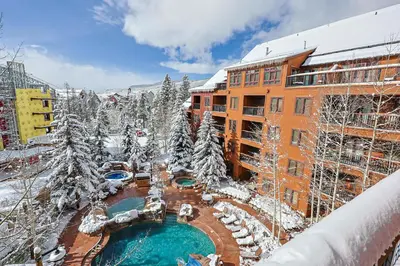 a resort in the snow with a pool at Springs 2 Bed3 Bath plus Murphy SPDW in Keystone