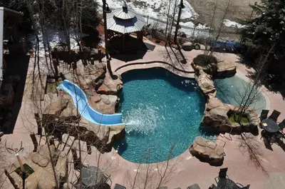 an overhead view of a pool with a water slide at Springs 2 Bed3 Bath plus Murphy SPDW in Keystone