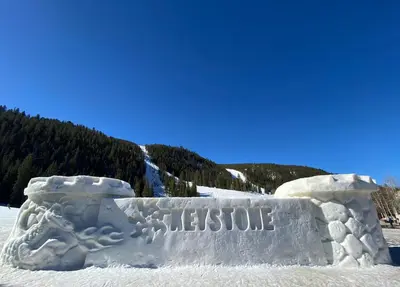 an ice sculpture of a sign in the snow at Hidden River Lodge 5981 by SummitCove Lodging in Keystone