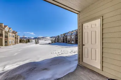 a door to a house in the snow at Bay Club 107 in Frisco
