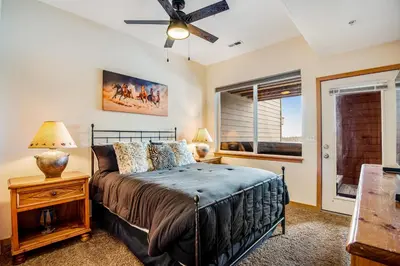 a bedroom with a bed and a window at Forest Park 31E in Silverthorne