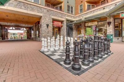a chess board in the middle of a building at 1 Bedroom Premier Mountain Condo In River Run Village Just A Short Walk To Shopping, Dining, And Skiing in Keystone